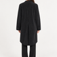 Cappotto donna Alessia Santi gessato in cotone su modella, retro – immagine elaborata con IA