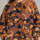 Cappotto donna Malìparmi fantasia floreale, dettaglio su modella – immagine elaborata con IA