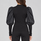 Maglia donna Imperial nera con maniche a sbuffo - retro su modella, elaborata con IA