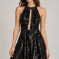 Abito Pinko nero con paillettes e aperture - dettaglio su modella