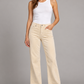 Pantaloni Please avorio a coste con fondo sfrangiato - fronte su modella
