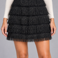 Gonna Dixie nera con frange su modella – dettaglio