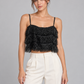 Top Dixie nero con frange su modella – fronte