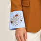 Dettaglio polso celeste con pietre decorative