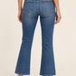 Jeans Liu Jo con bottoni a vista e tasche con zip - vista posteriore su modella