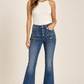 Jeans Liu Jo con bottoni a vista e tasche con zip - vista anteriore su modella