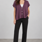 Cardigan donna Dixie viola con bottoni, fronte su modella — immagine elaborata con IA