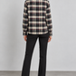 Camicia donna Motel a quadri con cravatta, retro — immagine elaborata con IA