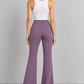 Pantalone donna Imperial malva svasato, retro — immagine elaborata con IA
