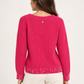 Maglione Pinko fucsia con dettagli gioiello retro