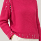 Maglione Pinko fucsia con dettagli gioiello dettaglio