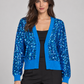 Cardigan blu acceso con paillettes blu e bordi in maglia blu – fronte su modella