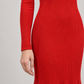 Abito Pinko rosso in maglia a coste con fondo svasato — dettaglio su modella (immagine generata con AI)