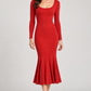 Abito Pinko rosso in maglia a coste con fondo svasato — fronte su modella (immagine generata con AI)