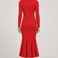 Abito Pinko rosso in maglia a coste con fondo svasato — retro su modella (immagine generata con AI)