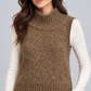 Gilet donna Dixie marrone mélange, dettaglio su modella, elaborata con IA